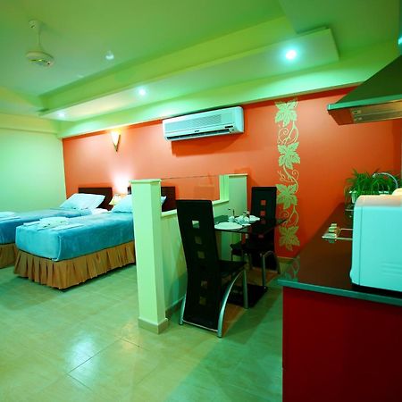 Johny International Hotel Muskat Bagian luar foto