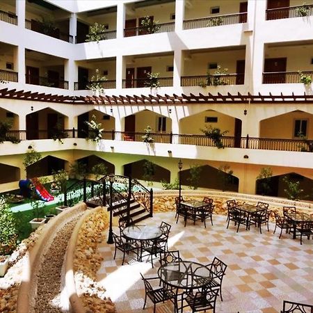 Johny International Hotel Muskat Bagian luar foto