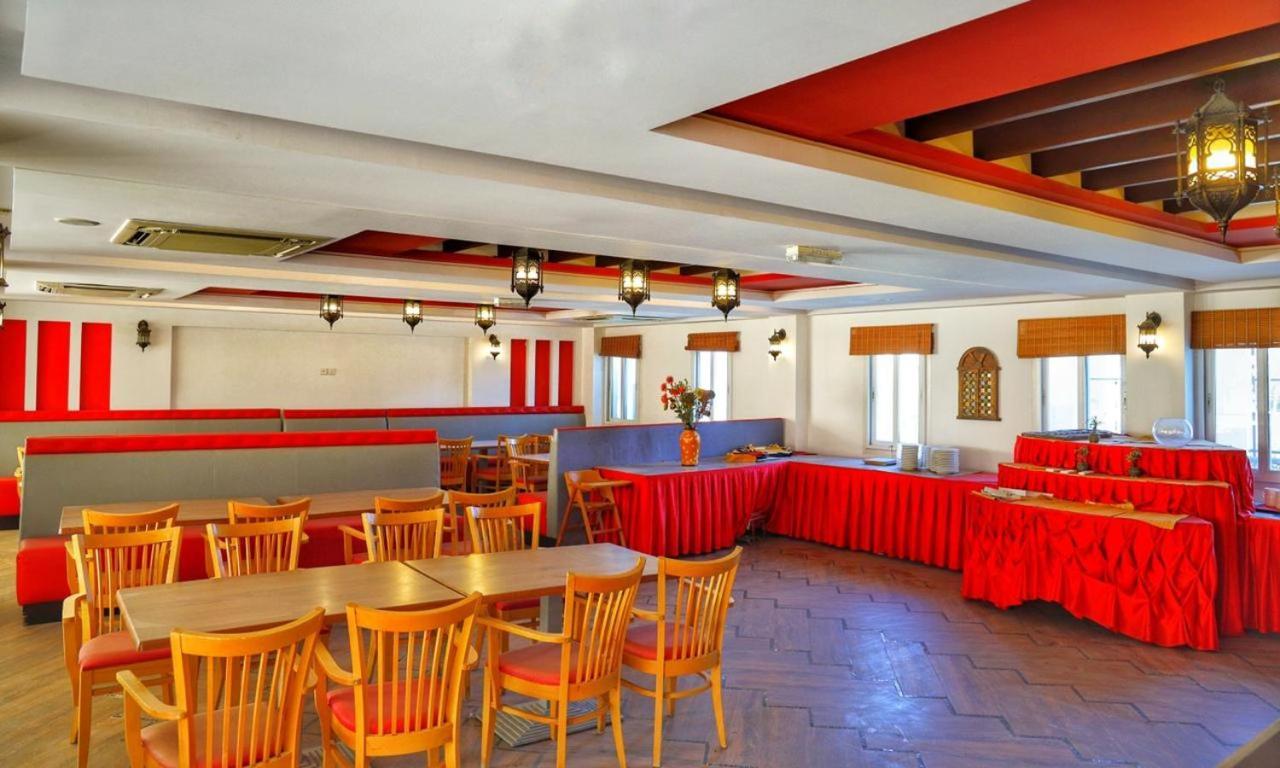Johny International Hotel Muskat Bagian luar foto