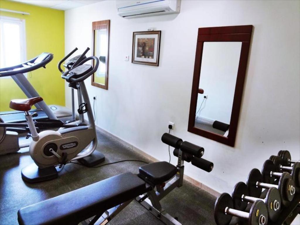 Johny International Hotel Muskat Bagian luar foto